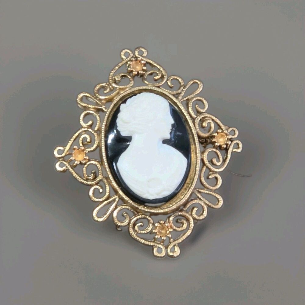 Vintage White On Black Cameo Brooch In Gold Tone Setting